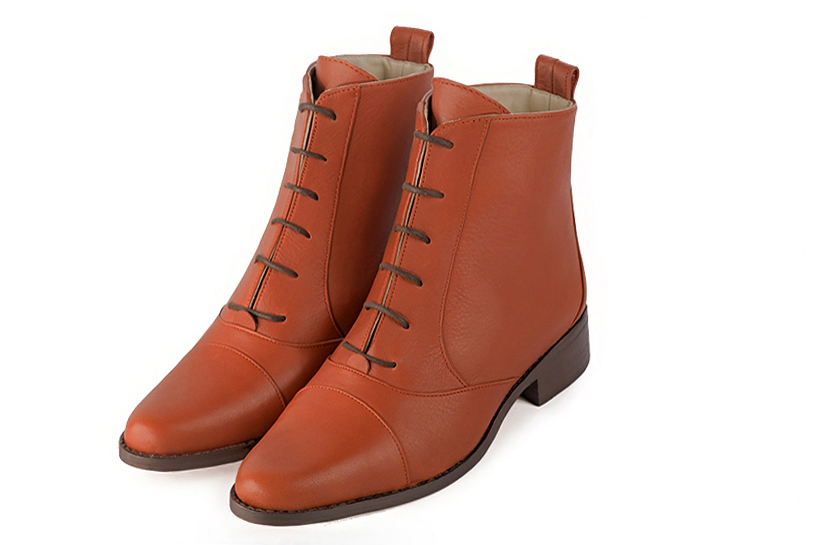 Terracotta orange women's ankle boots with laces at the front. Round toe. Flat leather soles. Front view - Florence KOOIJMAN